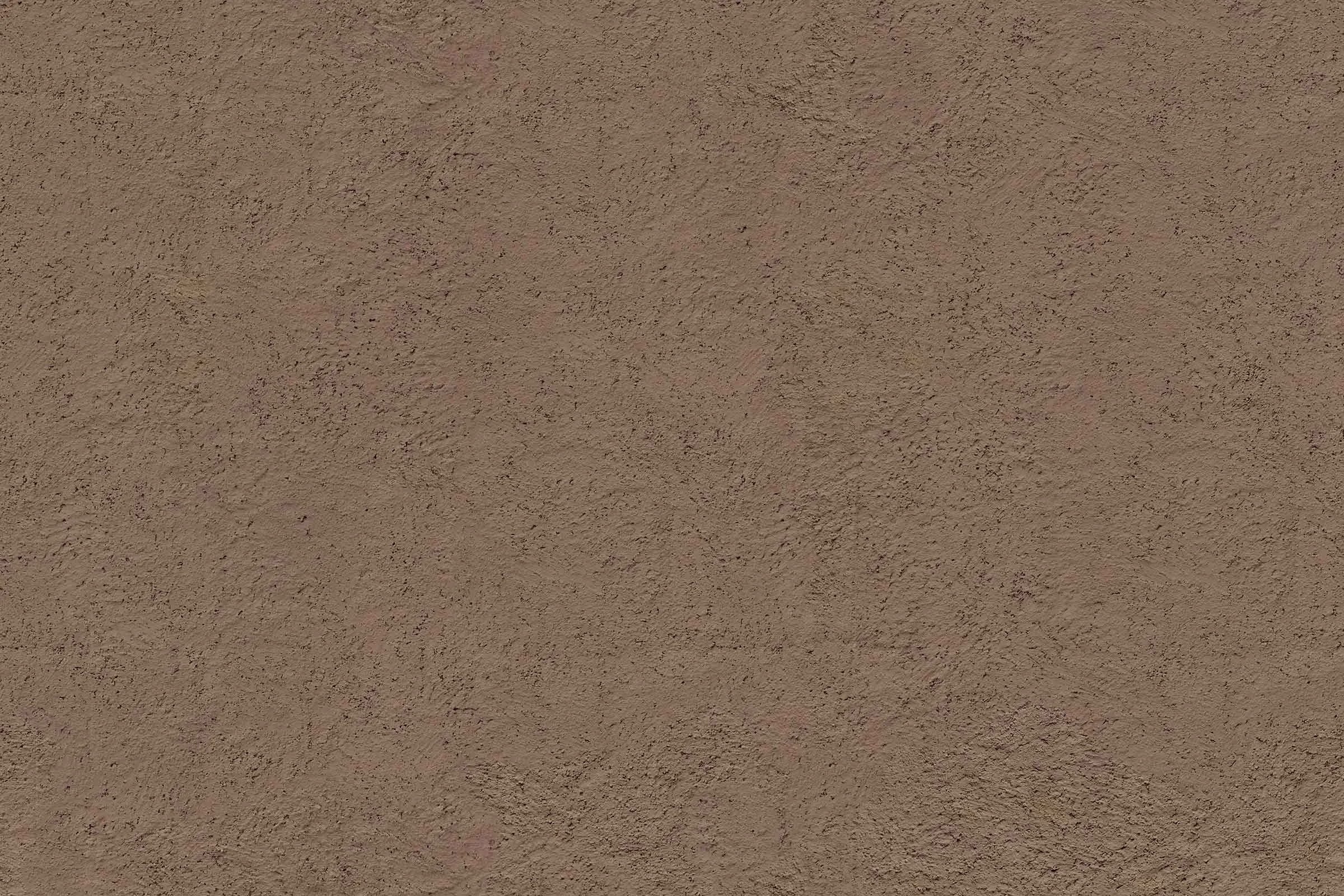 Digital close-up of a medium-brown coarse render texture from Sto as a finishing coat