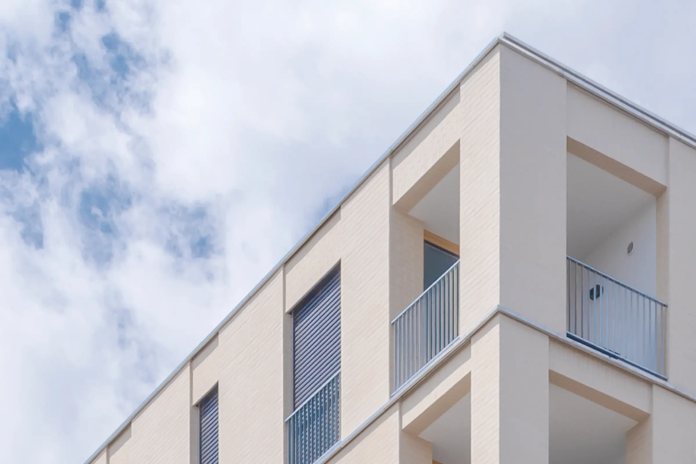 High-rise building with StoBrick facade cladding, light beige bricks